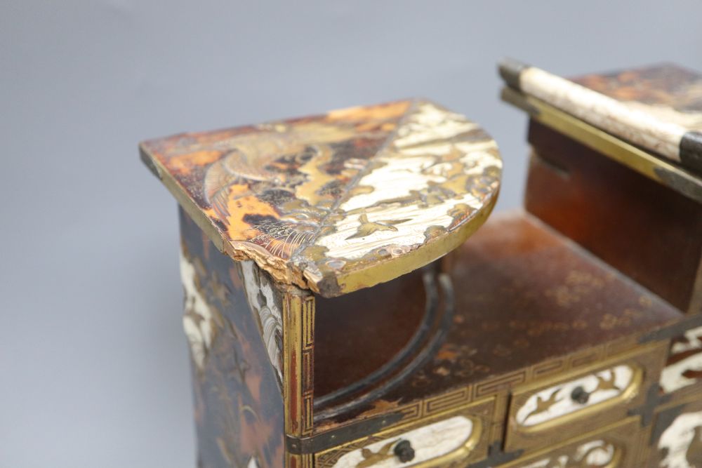 A Japanese Meiji lacquer table cabinet and similar stand, overall height 37.5cm